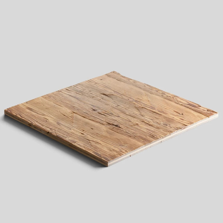A square wooden board with a natural light brown wood grain texture